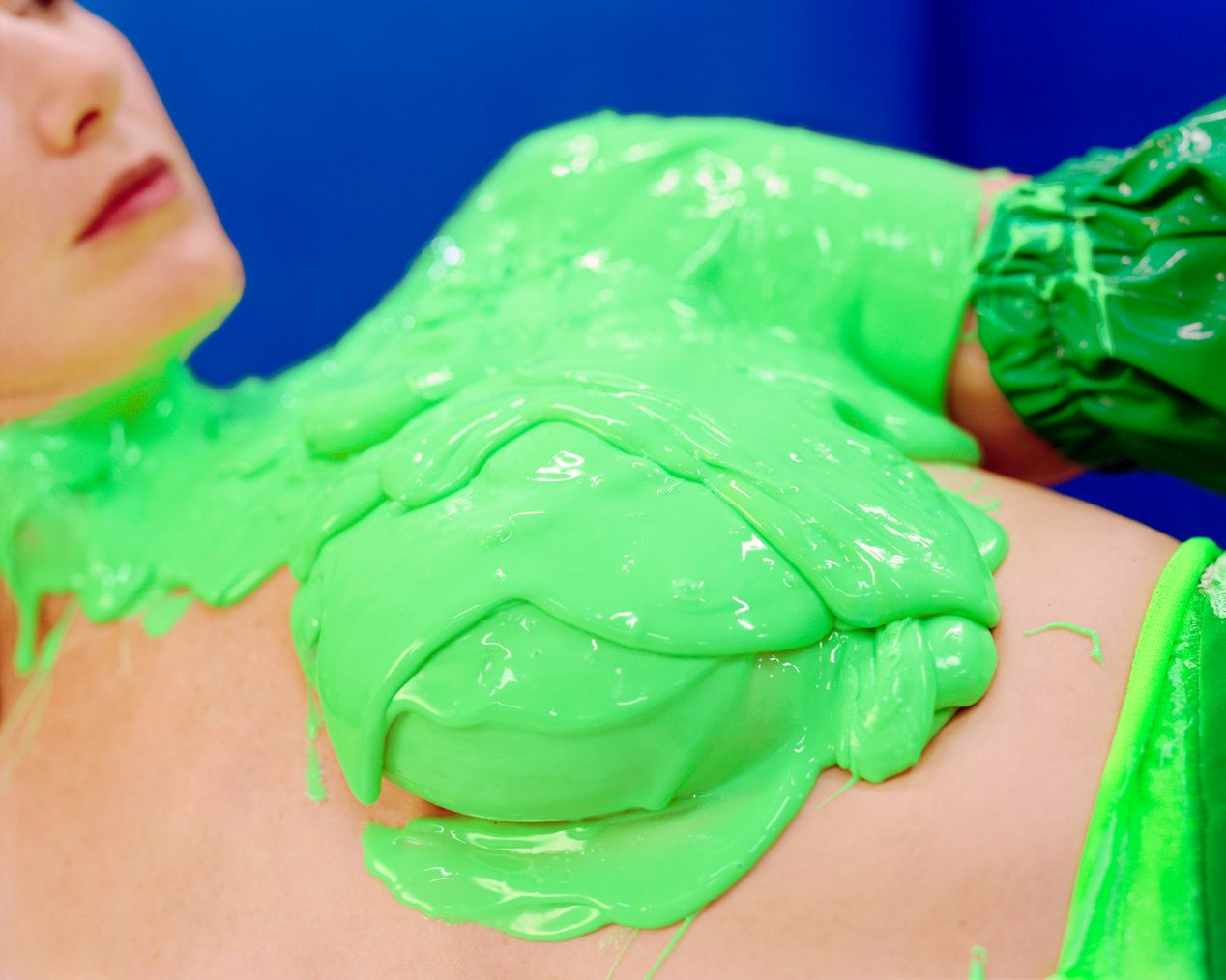 Closeup of a breast covered with green silicone, art photography, Ilona Szwarc, contemporary Los Angeles artist.