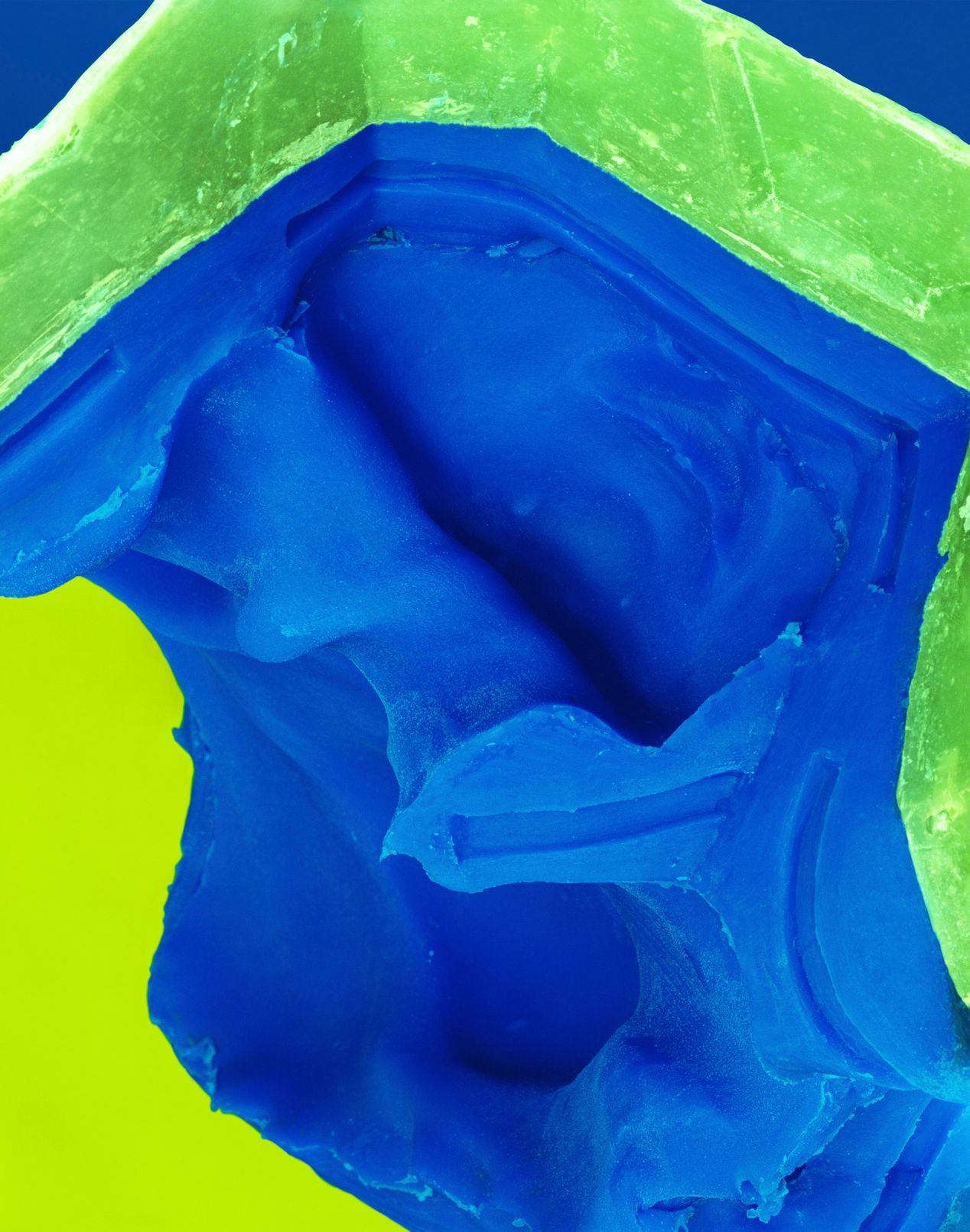Closeup of the inside of a blue face silicone mold, art photography, Ilona Szwarc, contemporary Los Angeles artist.