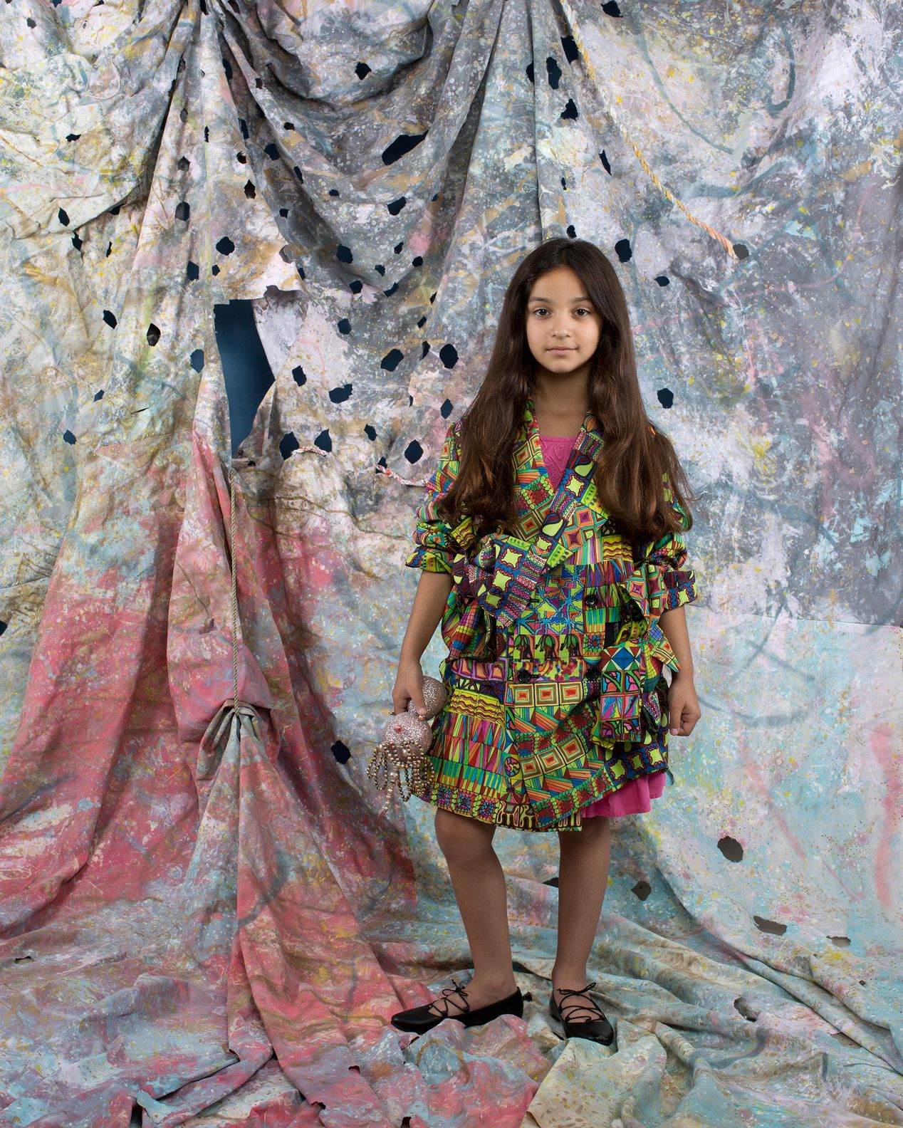 Studio portrait of a girl in a colorful suit, Ilona Szwarc, Los Angeles photographer. 