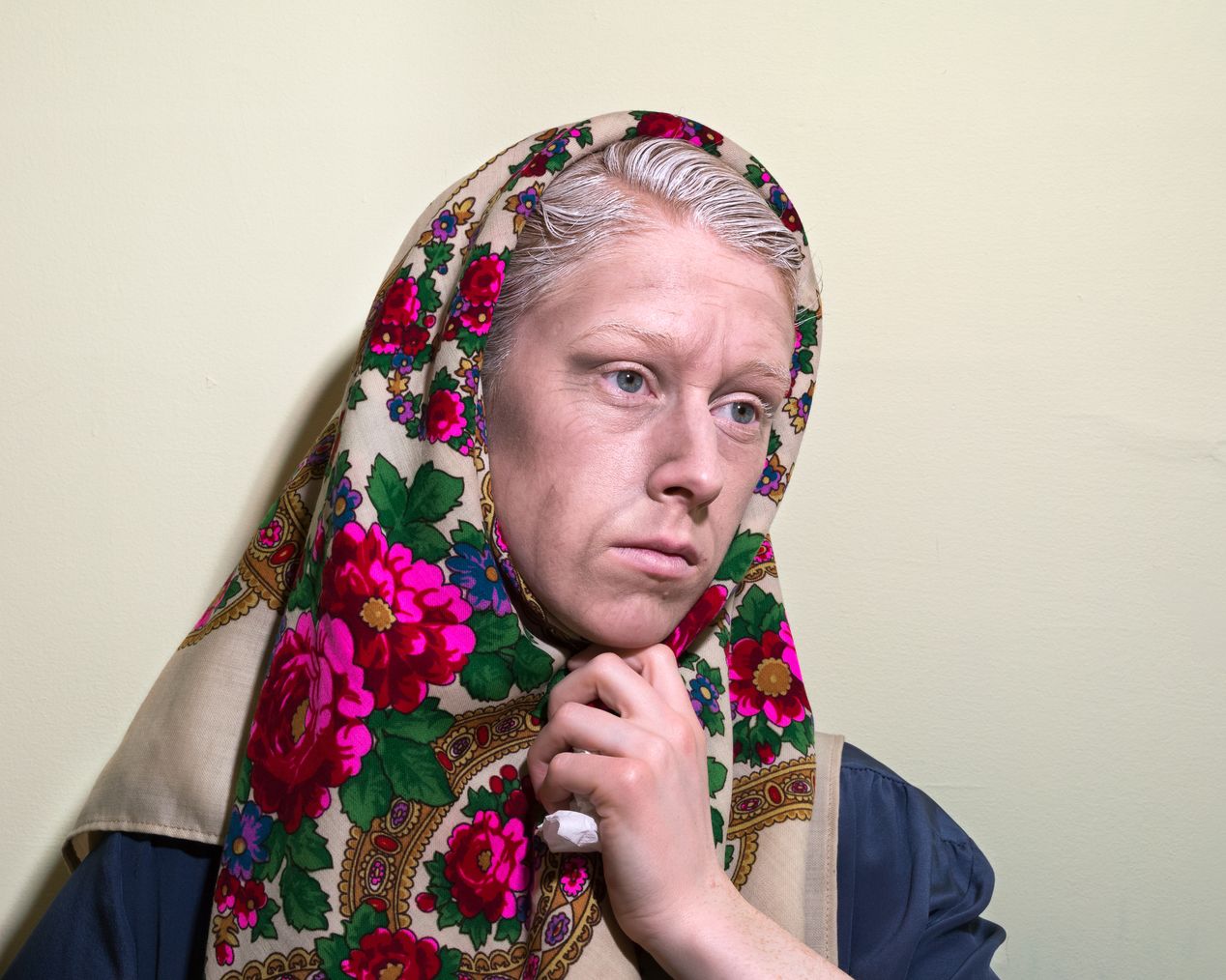 The model is transformed to an older woman, a babushka, art photography, Ilona Szwarc, contemporary Los Angeles artist.
