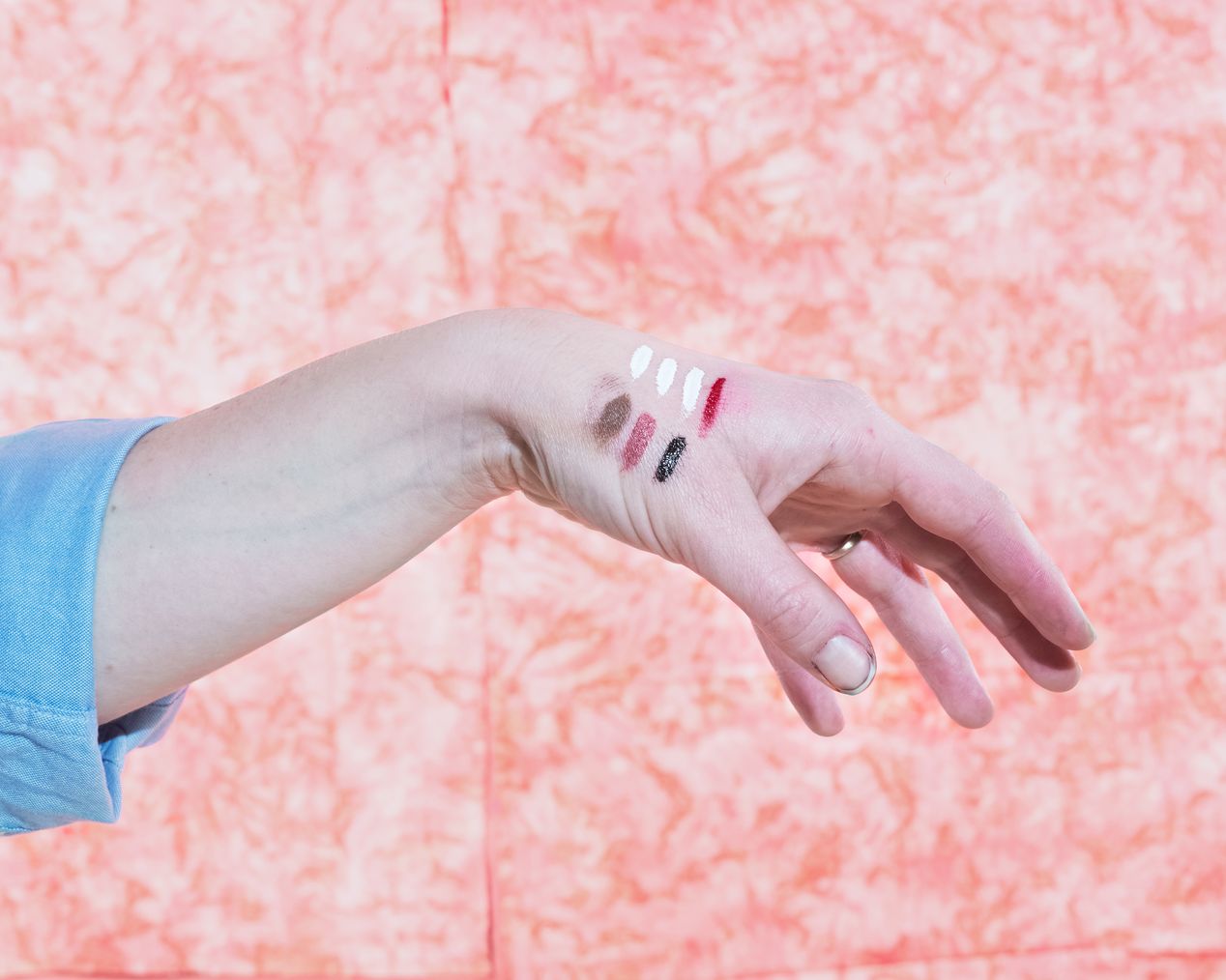 A hand with colorful marks on it, art photography, Ilona Szwarc, contemporary Los Angeles artist.