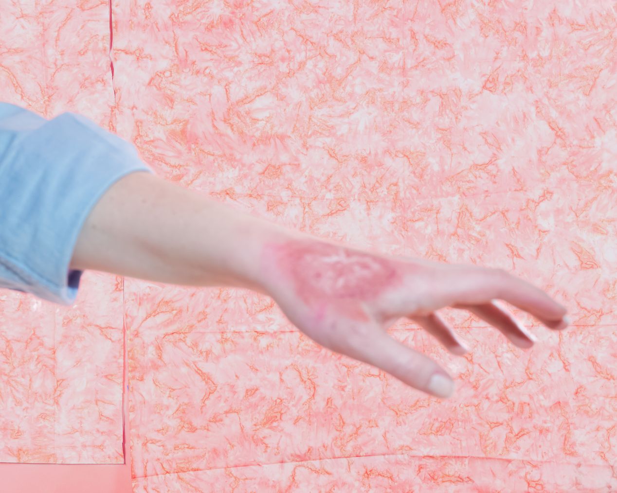 Blurred image of a painted wound on a hand, art photography, Ilona Szwarc, contemporary Los Angeles artist.