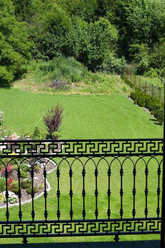 Landscape framed by a decorative railing, fine art photography, Ilona Szwarc, Los Angeles artist.